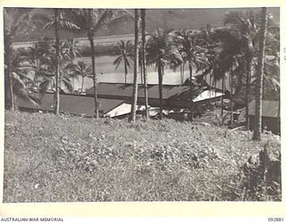 JACQUINOT BAY, NEW BRITAIN. 1945-06-09. THE CANTEEN BULK STORE SITUATED ON THE WATERFRONT AT HEADQUARTERS 5 BASE SUB-AREA