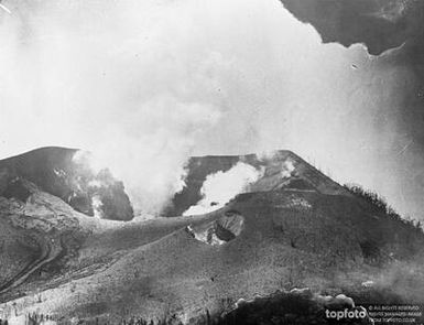 Smoke and volcanic mud pouring