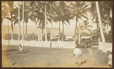 Motorcar in a village. From the album: Samoa