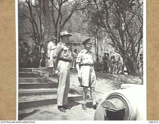 ELA BEACH, NEW GUINEA. 1943-11-13. NX8 LIEUTENANT GENERAL SIR LESLIE MORSHEAD, KCB, KBE, CMG, DSO, ED., GENERAL OFFICER COMMANDING, NEW GUINEA FORCE (1), ARRIVING AT THE COMBINED SERVICES SPORTS ..