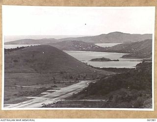 KILA AERODROME, PORT MORESBY AREA, NEW GUINEA. 1943-12-27. LOOKING OVER THE FAR END OF KILA AERODROME ON TO PORT MORESBY