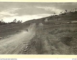 FINSCHHAFEN AREA, NEW GUINEA. 1944-03-21. A SECTION OF A PANORAMA VIEWING NORTH HILL FROM WITHIN THE AREA OF HEADQUARTERS, 2ND AUSTRALIAN CORPS. (JOINS WITH 71431)
