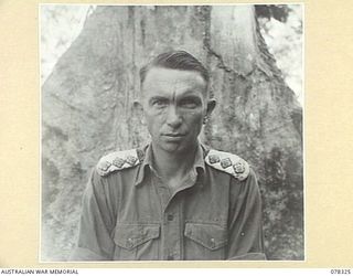 TOROKINA, BOUGAINVILLE ISLAND. 1945-01-12. VX7613 CAPTAIN C.P. MCCUBBERY, 25TH FIELD SECURITY SECTION, ATTACHED HEADQUARTERS, 2ND AUSTRALIAN CORPS