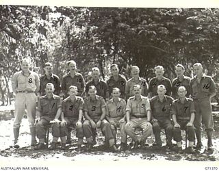KILIGIA, NEW GUINEA, 1944-03-16. OFFICERS SHORTLY BEFORE ATTENDING A CONFERENCE AT HEADQUARTERS 5TH DIVISION. IDENTIFIED PERSONNEL ARE: QX35727 LIEUTENANT C. HORN (3); SX3796 MAJOR J.K. LYNCH (4); ..