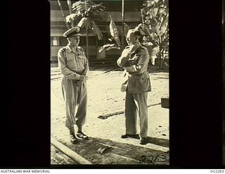 TOROKINA, BOUGAINVILLE ISLAND, SOLOMON ISLANDS. 1945-02-18. CHIEF OF AIR STAFF (CAS), AIR VICE MARSHAL JONES CB CBE DFC (LEFT), CHATTING WITH GENERAL OFFICER COMMANDING, LIEUTENANT GENERAL S. G. ..