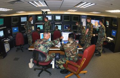 US Air Force (USAF) 15th Communications Squadron (CS) personnel at work at the Network Control Center (NCC) on Hickam Air Force Base (AFB), Hawaii (HI)