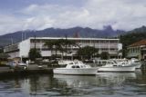 French Polynesia, boats docked in harbor across from Donald department store in Papeete