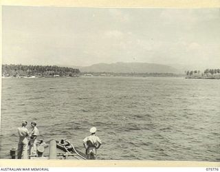 MADANG, NEW GUINEA. 1944-09/08. THE RAN CORVETTE, GEELONG ENTERING THE HARBOUR