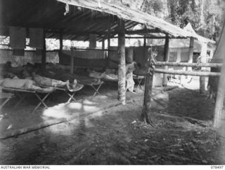 TAGESSI, BOUGAINVILLE ISLAND. 1945-01-17. A SECTION OF THE MEDICAL WARD AT THE MEDICAL DRESSING STATION OF THE 7TH FIELD AMBULANCE