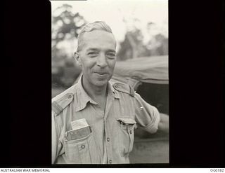 VIVIGANI, GOODENOUGH ISLAND, PAPUA NEW GUINEA. 1943-09-26. INFORMAL PORTRAIT OF PILOT OFFICER ARTHUR GREEN OF LOCKLEY, SA, A MEMBER OF NO. 7 MOBILE WORKS SQUADRON RAAF