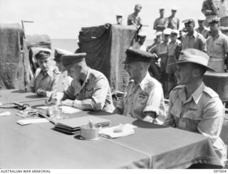 OCEAN ISLAND. 1945-10-01. SOME OF THE MEMBERS OF THE OFFICIAL PARTY PRESENT AT THE SURRENDER CEREMONY HELD ABOARD HMAS DIAMANTINA. LIEUTENANT COMMANDER NAOOMI SUZUKI, COMMANDER JAPANESE FORCES ON ..