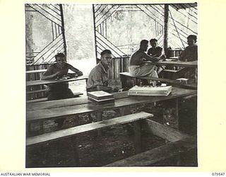 ORO BAY, NEW GUINEA. 1943-07. PATIENTS IN THE RECREATION HUT OF THE 10TH FIELD AMBULANCE MAIN DRESSING CENTRE