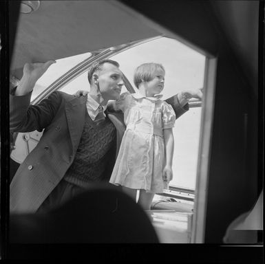 Passenger F N Gray and his young child Jennifer on Qantas Catalina flying boat service from Suva, Fiji, to Sydney, Australia