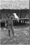 Fainjur: white cockatoo perched on man's arm