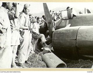 PORT MORESBY, PAPUA, 1942-07-25. A MARAUDER (B26) BOMBER AIRCRAFT OF US AIR FORCE 22ND BOMB GROUP MAKING A FORCED LANDING ON AN AIRFIELD IN NEW GUINEA PLOUGHED THROUGH THE EARTH UNTIL BROUGHT TO A ..