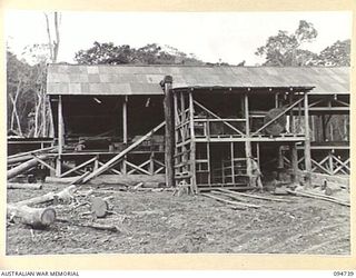 YALU AREA, NEW GUINEA, 1945-07-30. THE SIDE VIEW OF THE SAW MILL OPERATED BY NO. 3 PLATOON, 2/1 FORESTRY COMPANY, ROYAL AUSTRALIAN ENGINEERS