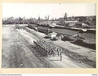 WEWAK, NEW GUINEA. 1945-10-26. A CEREMONIAL PARADE AND MARCH PAST BY 6 DIVISION WAS INSPECTED BY GENERAL SIR THOMAS A. BLAMEY, COMMANDER-IN-CHIEF, ALLIED LAND FORCES, SOUTH WEST PACIFIC AREA, AT ..