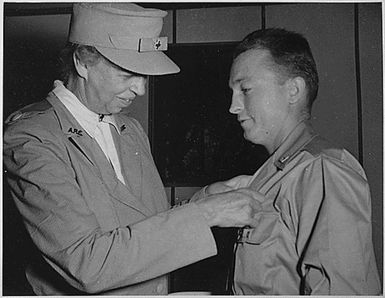 Eleanor Roosevelt awards Purple Heart in New Caledonia