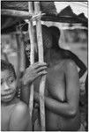 Mortuary ceremony, Omarakana: mourning woman and child at ritual exchange