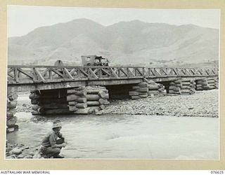 WAWIN, MARKHAM VALLEY, NEW GUINEA. 1944-10-24. A SUBSTANTIAL BRIDGE ACROSS THE MARKHAM RIVER NEAR NADZAB ON THE NADZAB- KAIAPIT ROAD
