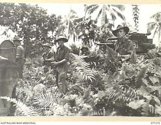 MADANG, NEW GUINEA. 1944-12-14. "MATILDA" TANKS OF THE 2/4TH ARMOURED REGIMENT SUPPORTING AUSTRALIAN INFANTRY DURING A JUNGLE TRAINING EXERCISE. IDENTIFIED PERSONNEL ARE:- VX62814 TROOPER R.A. PEEL ..