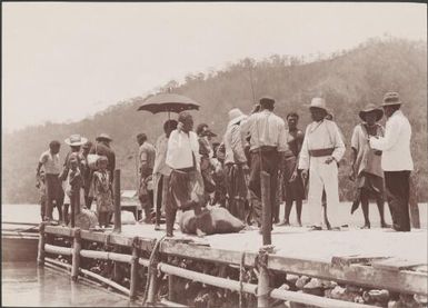 People gathered on the jetty at Mara-na-tabu, Solomon Islands, 1906, 1 / J.W. Beattie
