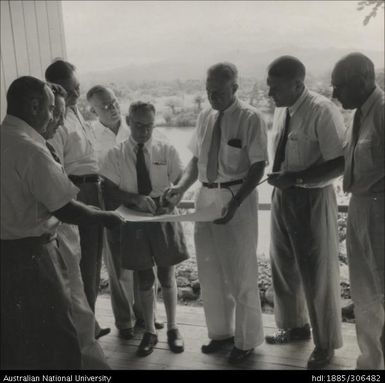 Field Officers reviewing map