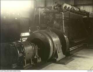 Lae, New Guinea. 1945-05-24. A generator at Lae powerhouse