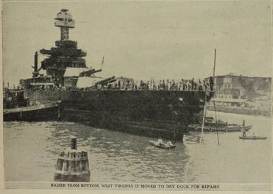 Raised off the bottom of Pearl Harbour, the battleship West Virginia is moved to dry dock for repairs