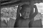 Young child on a house verandah