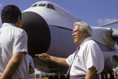 Somoan Governor A.P. Lutali and other local officials stand by to greet a 22nd Military Airlift Squadron C-5 Galaxy aircraft at the Pago Pago International Airport. The aircraft is carrying an emergency electrical generator and equipment