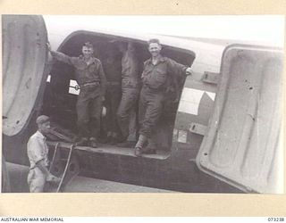 DUMPU, NEW GUINEA. 1944-05-19. PERSONNEL FROM HEADQUARTERS 11TH DIVISION ABOARD NO. 2 AIRCRAFT, A DOUGLAS C47 TRANSPORT AIRCRAFT OF THE UNITED STATES ARMY AIR FORCE. THE AIRCRAFT, LOADED WITH THE ..