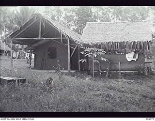 MILNE BAY, PAPUA. 1944-05. EXTERIOR OF THE HOSPITAL OPERATING THEATRE. (NAVAL HISTORICAL COLLECTION)