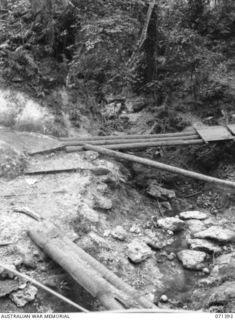 UPPER ILEBBE CREEK, FINSCHHAFEN AREA, NEW GUINEA, 1944-03-20. THE SECTION OF THE UPPER ILEBBE CREEK WHERE ONE COMPANY OF THE 2/13TH INFANTRY BATTALION, DURING THE MOVE TO ATTACK KAKAKOG CAPTURED ..