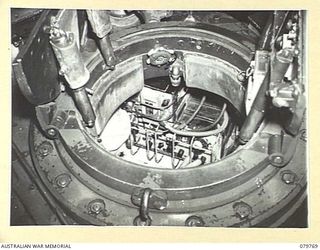 AITAPE, NEW GUINEA. 1945-03-16. A NO.19 MK 2 (ENGLISH) WIRELESS SET POSITIONED IN A MATILDA TANK OF THE 2/4 ARMOURED REGIMENT, AUSTRALIAN ARMOURED CORPS
