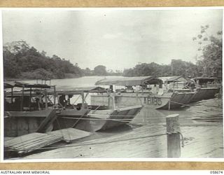 TERAPO, NEW GUINEA, 1943-09-16. AUSTRALIAN LANDING CRAFT VEHICLES AT THE TERAPO LOADING RAMP