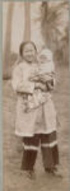 Social Settlements: Hawaii. Wailuku. Alexander House: Alexander House, Wailuku, Hawaii: A Chinese mother wearing American shoes; baby wears American cap.