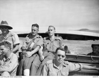 PORT MORESBY, NEW GUINEA. 1943-08-11. ON BOARD THE "MAINO", A SHIP OF THE 1ST AUSTRALIAN WATER TRANSPORT GROUP (SMALL CRAFT). LEFT TO RIGHT:- REAR: VX233 LIEUTENANT COLONEL T. G. SWINBURNE, 105TH ..