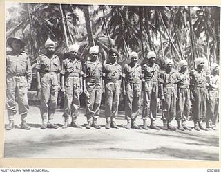 AITAPE, NEW GUINEA. 1945-03-29. A GROUP OF INDIAN SOLDIERS RESCUED FROM THE JAPANESE, RECUPERATING AT 104 CASUALTY CLEARING STATION AFTER MONTHS OF ILL- TREATMENT AS PRISONERS- OF- WAR. IDENTIFIED ..