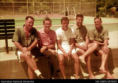 Five men at the swimming pool