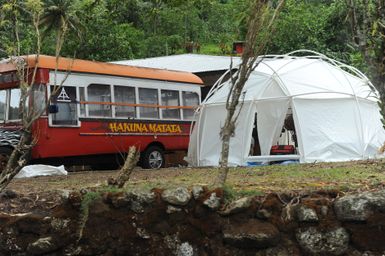 Earthquake ^ Flooding ^ Tsunami - Pago Pago, American Samoa, October 15, 2009 -- A family temporarily lives in a tent provided by the Federal Emergency Management Agency. The family owned bus appears to reflect their attitude, Hakuna Matata which in Swahili means no worries. David Gonzalez/FEMA