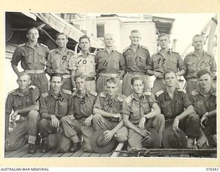 AT SEA, NEW GUINEA. 1944-10-07. OFFICERS OF THE 36TH INFANTRY BATTALION ABOARD THE DUTCH TROOPSHIP, "SWARTENHONDT" WHILE EN ROUTE FOR NEW BRITAIN. IDENTIFIED PERSONNEL ARE:- NX59508 LIEUTENANT P.A. ..