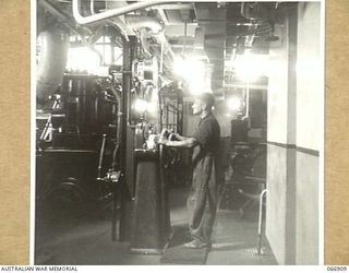 NEW GUINEA. 1944-06-15. A SECTION OF THE ENGINE ROOM OF THE AB442 A VESSEL OF THE 12TH WATER TRANSPORT OPERATING COMPANY