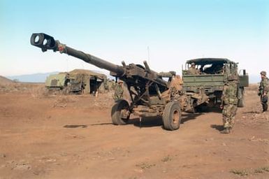 A M198 155mm Medium Towed Howitzer from Bravo Battery, 1ST Battalion, 12th Marines, 3rd Marine Regiment is positioned during a combined arms live fire exercise. The M198 is constructed of aluminum and steel, and is air transportable by CH-53E helicopter and C-130 or larger fixed-wing aircraft. Maximum effective range with conventional ammunition is 22,400 meters (13.92 miles) and with a rocket-assisted projectile, 30,000 meters (18.64 miles)