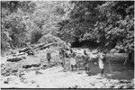 Yagip River: carriers cross with cargo