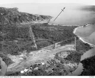 SALAMAUA, NEW GUINEA. 1943-08-03. AERODROME AT SALAMAUA SHOWING FRANCISCO RIVER AND SAMOA HARBOUR. RADIO STATION CAN BE SEEN IN TOP MIDDLE