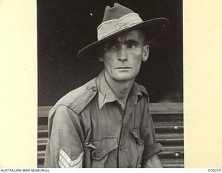 NEW GUINEA. 1944-01-30. VX90176 SERGEANT R.J. BUCHANAN (1) OF THE MILITARY HISTORY SECTION