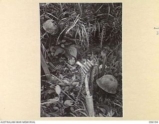 WIRUI MISSION, WEWAK AREA, NEW GUINEA, 1945-09-07. JAPANESE WEAPON PIT, ONE OF TWO, WHICH PINNED DOWN TWO SECTIONS OF NO.8 PLATOON, 2/4 INFANTRY BATTALION, ON 1945-09-07. BOTH WEAPON PITS WERE ..