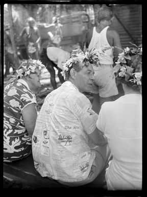 Welcoming reception in Tahiti showing Eddie Lund with guests