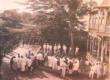 New Zealand forces hoisting the Union Jack at the courthouse, Apia